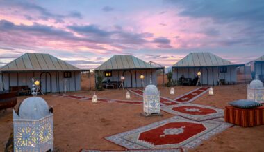 three houses near outdoor light during daytime